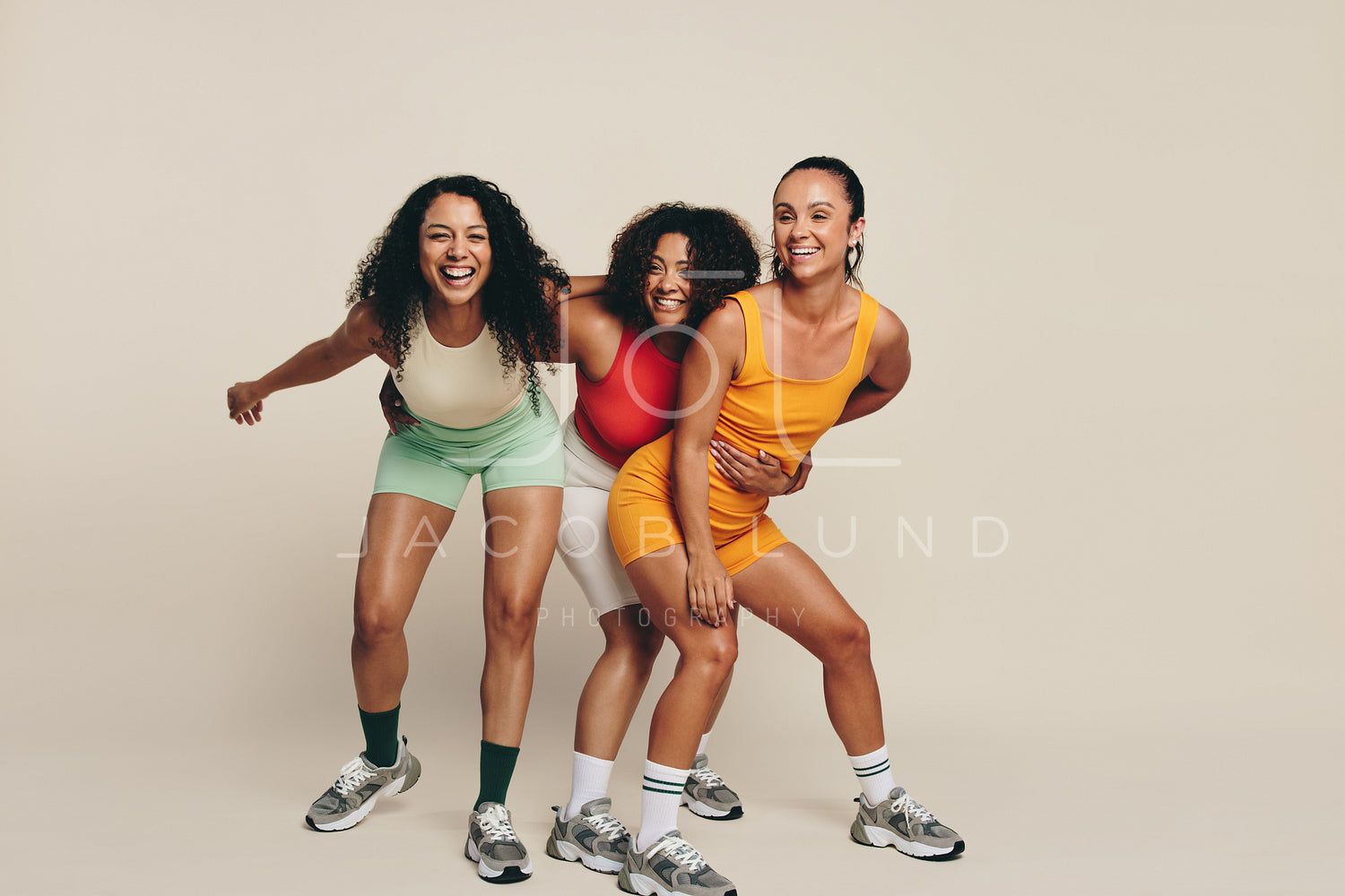Fitness fun: Group of happy female athletes laughing in sportswear – Jacob  Lund Photography Store- premium stock photo