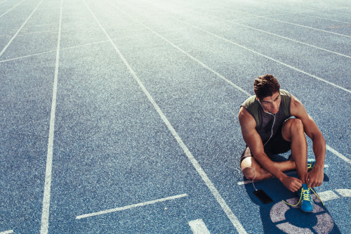 Female sprinter taking off from starting block on a running track – Jacob  Lund Photography Store- premium stock photo