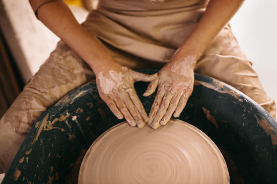 Potter moulding clay on pottery wheel stock photo (133732) - YouWorkForThem