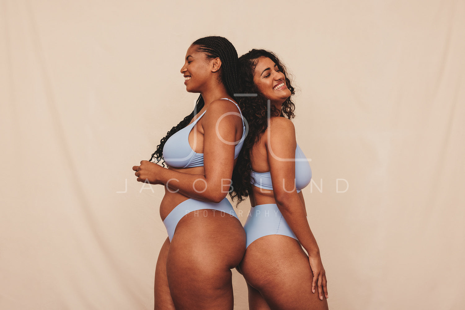 Female friends feeling comfortable in blue underwear – Jacob Lund  Photography Store- premium stock photo