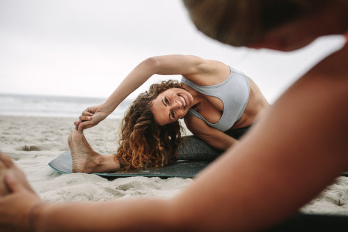 Woman doing Natarajasana yoga pose on the beach – Jacob Lund Photography  Store- premium stock photo