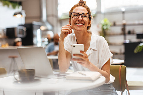 Smiling barista making espresso with a coffee maker – Jacob Lund  Photography Store- premium stock photo