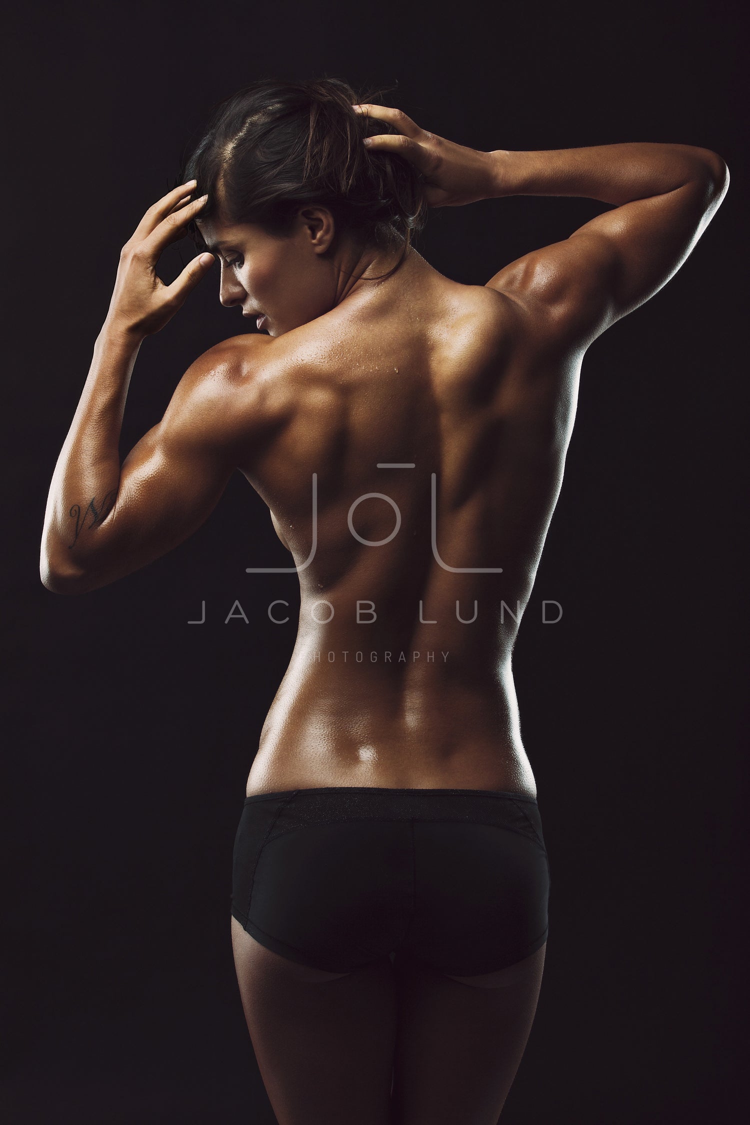 Fit young female bodybuilder posing – Jacob Lund Photography Store- premium  stock photo