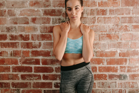 Fit woman holding gymnast rings at the gym – Jacob Lund Photography Store-  premium stock photo