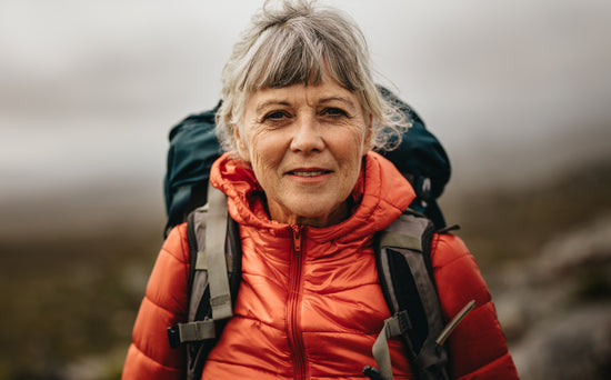 Portrait of a woman on a hiking adventure – Jacob Lund Photography Store-  premium stock photo