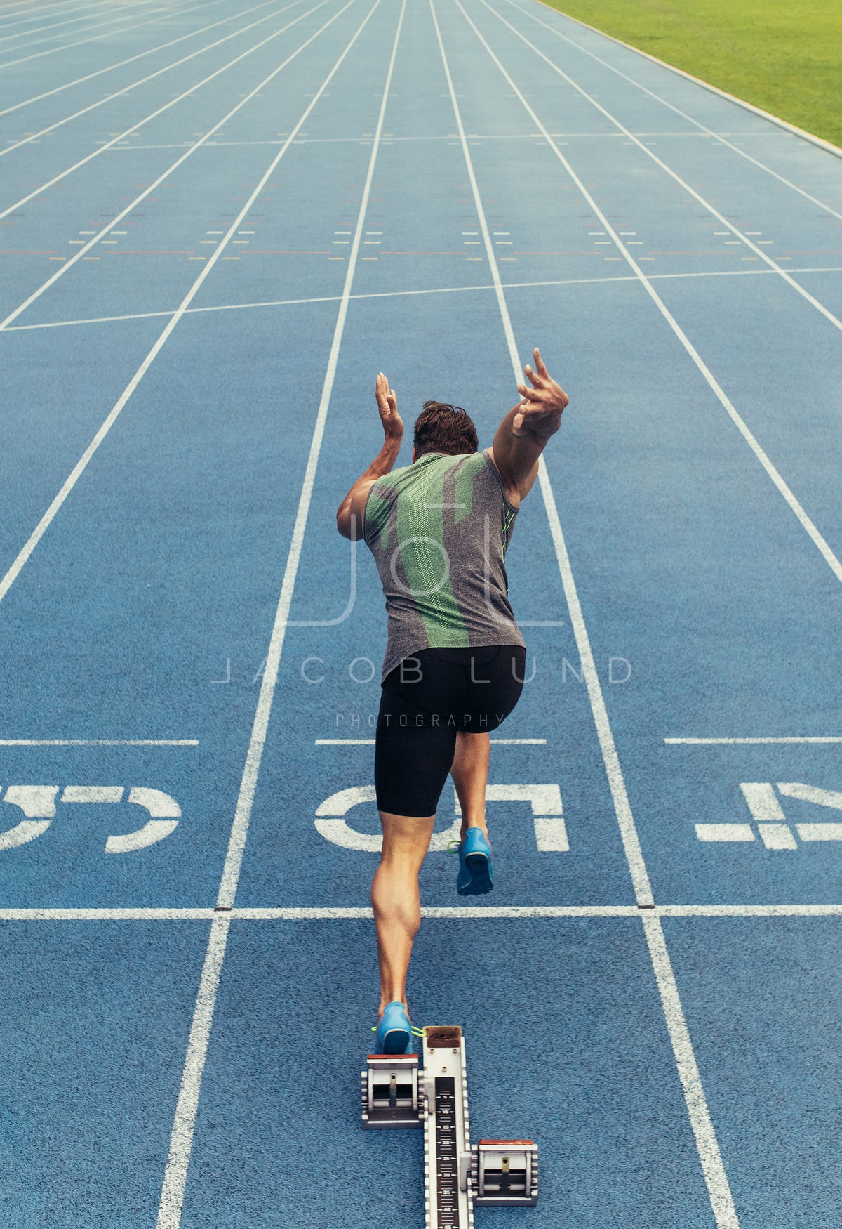 Female sprinter taking off from starting block on a running track – Jacob  Lund Photography Store- premium stock photo