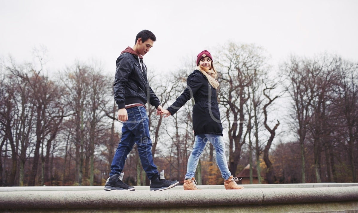 Cute young couple out for a walk together – Jacob Lund Photography Store-  premium stock photo