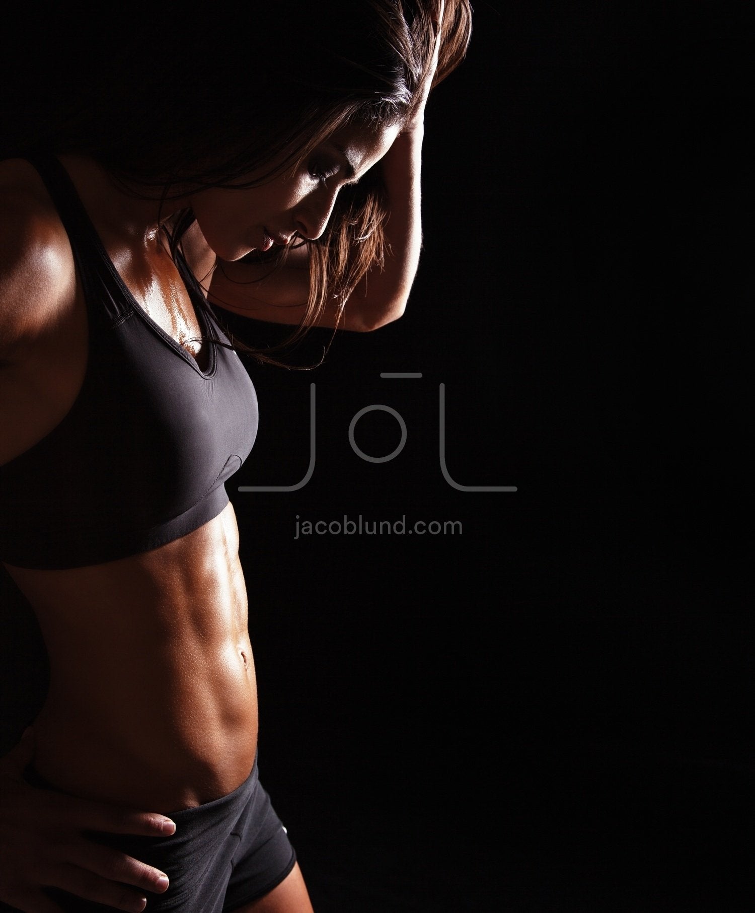 Young sports woman relaxing after her workout – Jacob Lund Photography Store-  premium stock photo