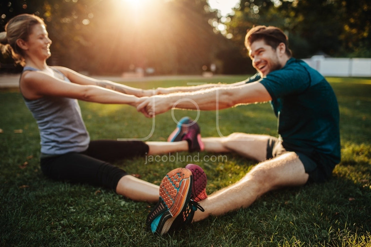 Two young women doing workout in pair – Jacob Lund Photography Store-  premium stock photo