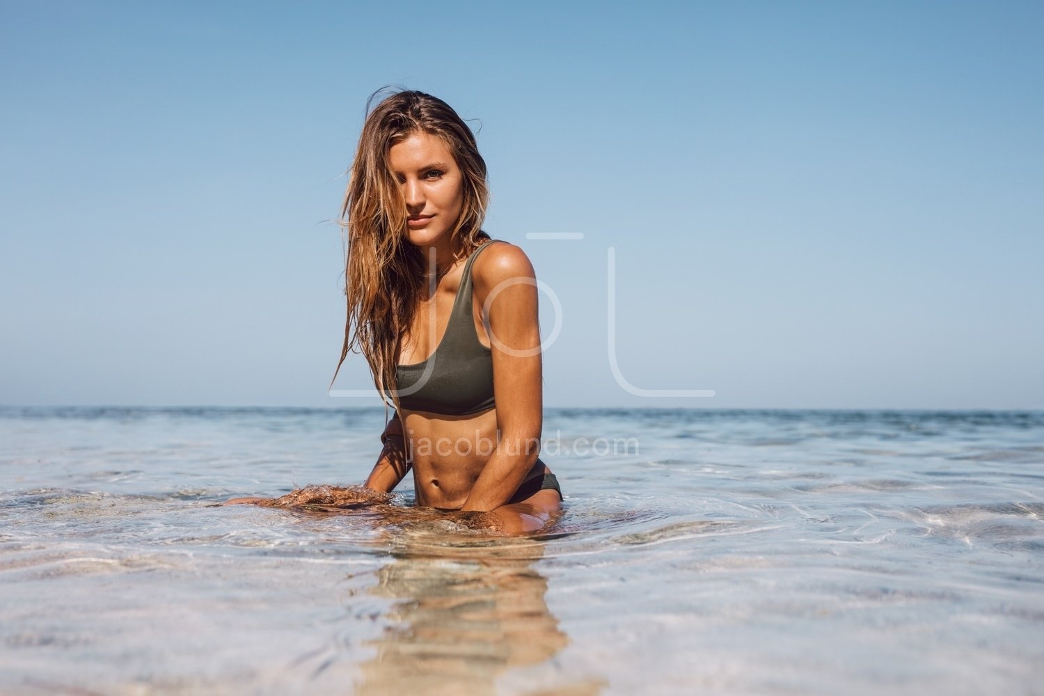 Beautiful young woman after swimming – Jacob Lund Photography Store-  premium stock photo