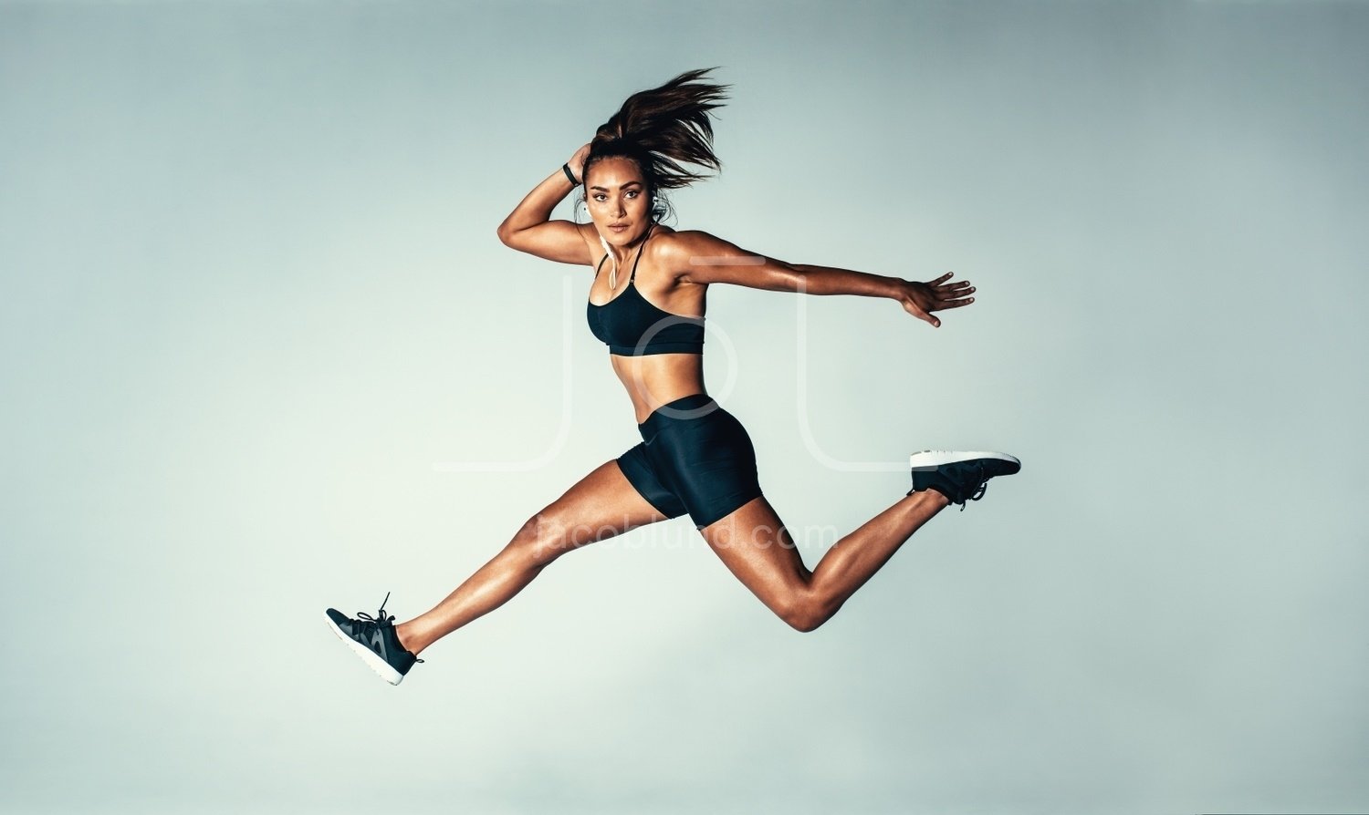 https://jacoblund.com/cdn/shop/products/photo-id-2000842129477-female-model-in-sports-wear-jumping-in-air.jpg?v=1563881229