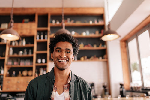 Smiling barista making espresso with a coffee maker – Jacob Lund  Photography Store- premium stock photo