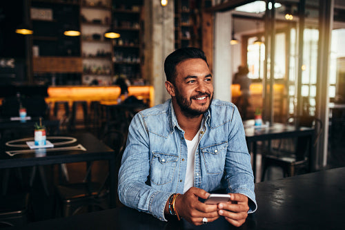 Smiling barista making espresso with a coffee maker – Jacob Lund  Photography Store- premium stock photo