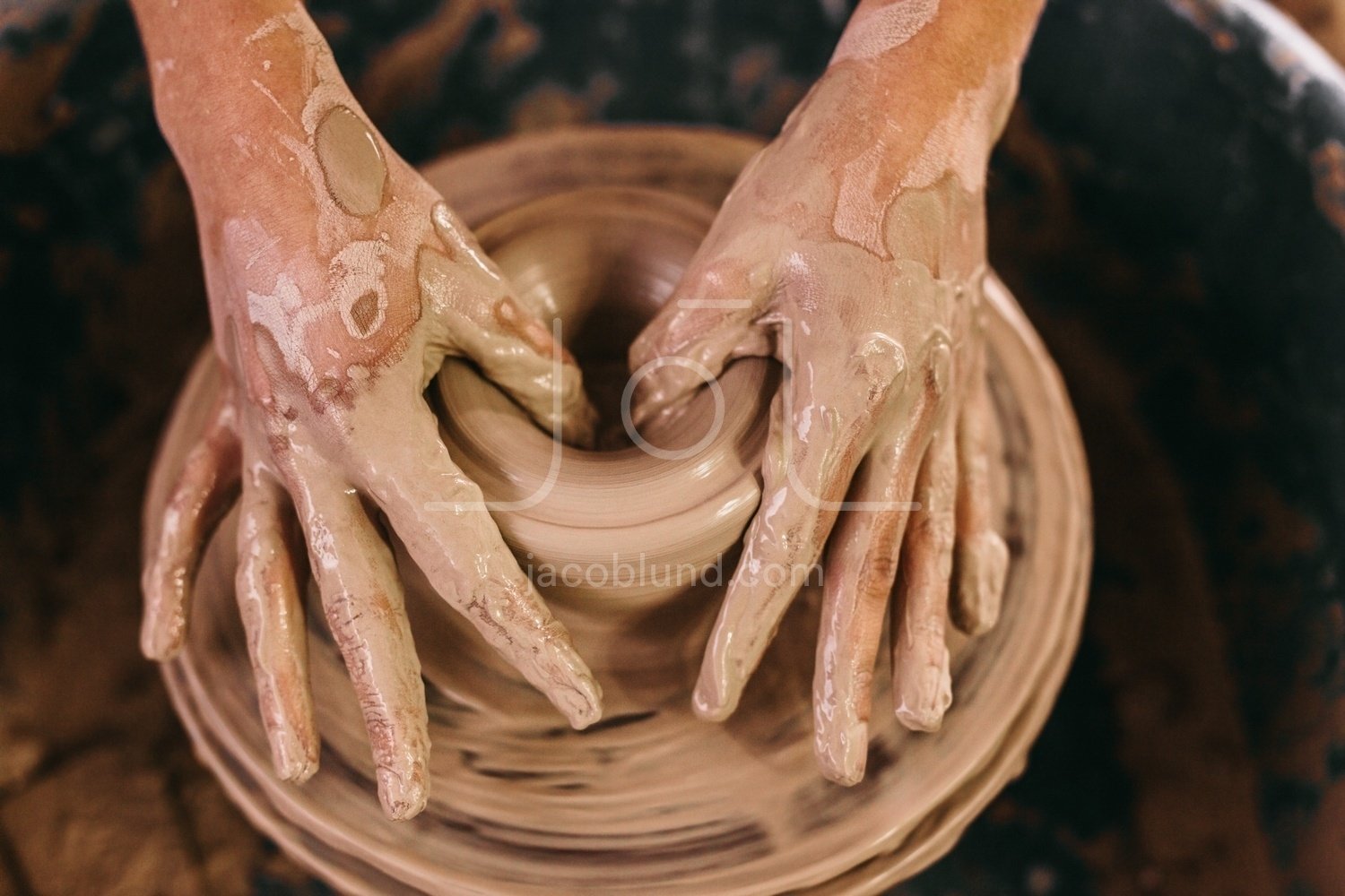 Potter moulding clay on pottery wheel – Jacob Lund Photography Store-  premium stock photo