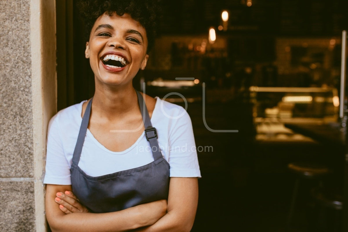 happy-cafe-owner-jacob-lund-photography-store-premium-stock-photo