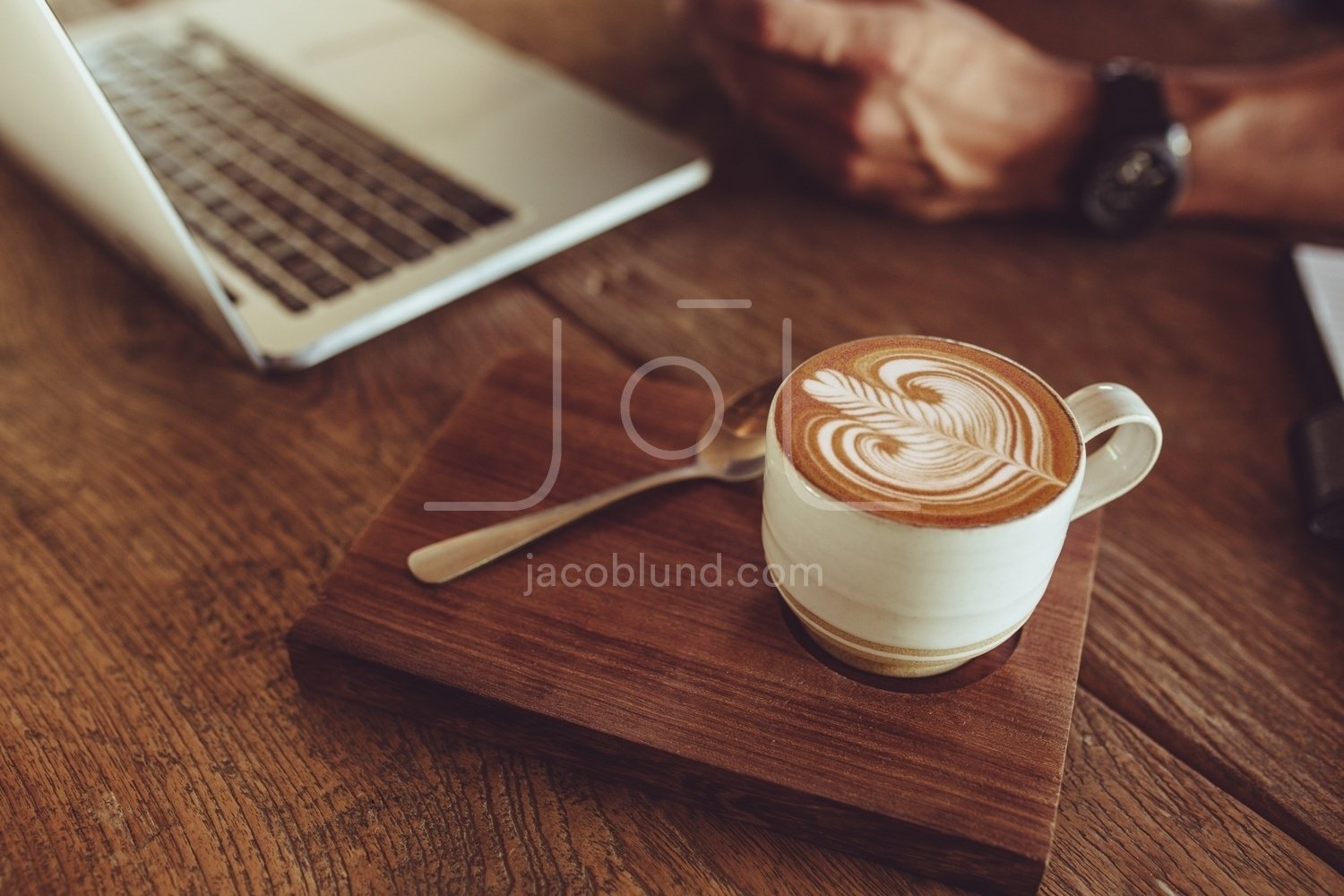 Premium Photo  Hot coffee capuccino cup with latte art on wood