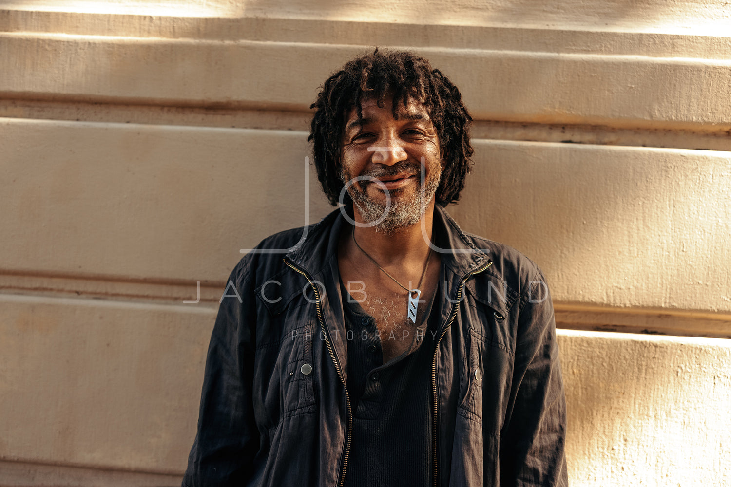 smiling homeless man